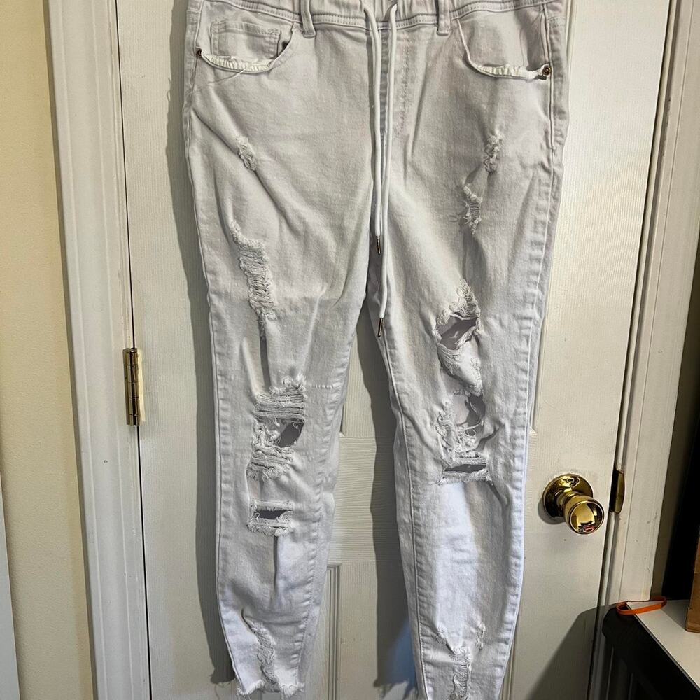 Elite white distressed jeans with